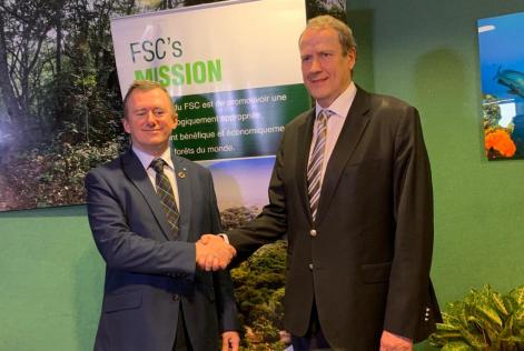 Minister of Forests of Gabon and Kim Carstensen, Executive Director of FSC sign partnership agreement.